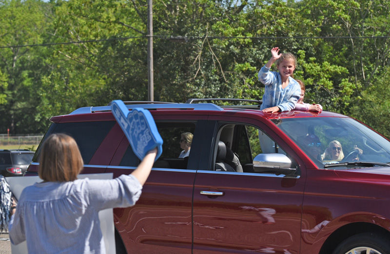 Teachers hold parade for students at Houston Academy